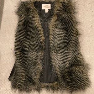 Forever21 faux fur vest. Polyester shell.
